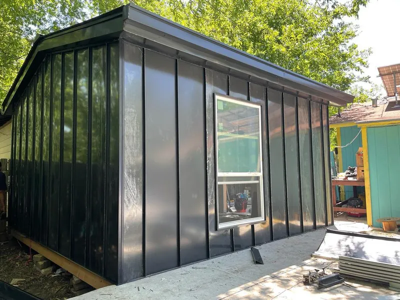 Black standing seam metal wall panels for Roof Inspection in Dobbs Ferry