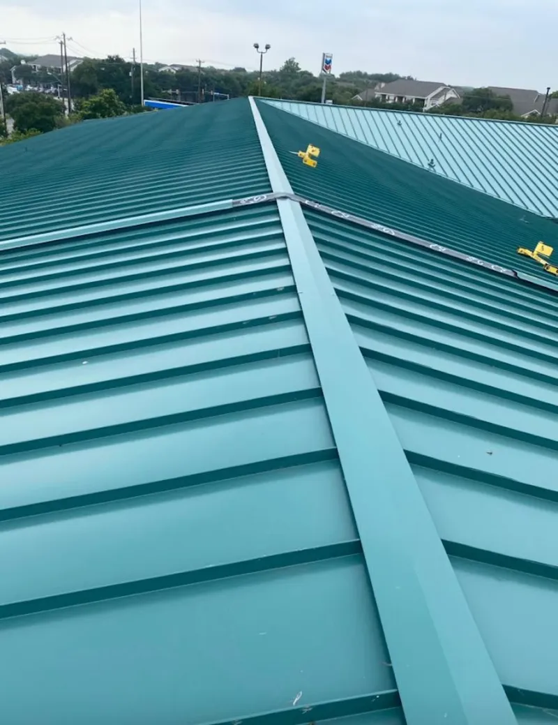 Green commercial metal roof ridge and valley for Metal Roof Repair in Dobbs Ferry